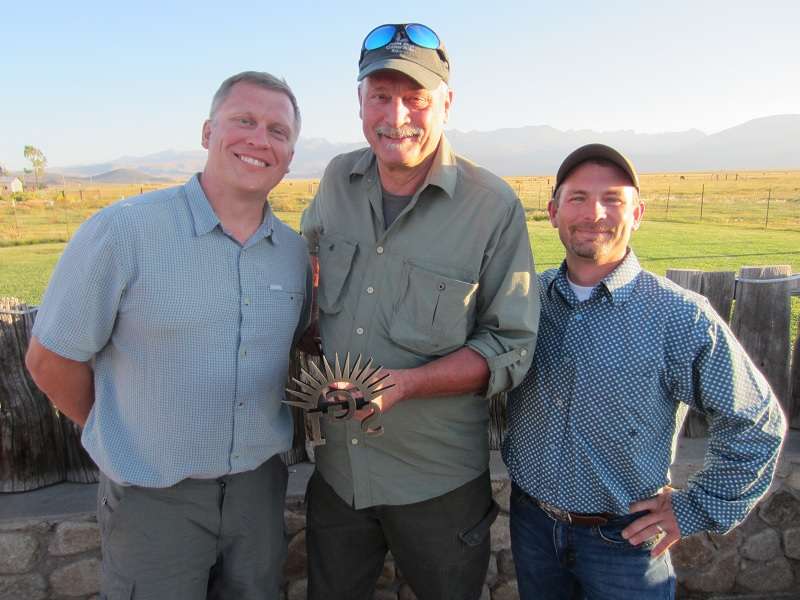 Wendell Gilgert of Point Blue Conservation Science poses with Dave Naugle and Tim Griffiths  after receiving his conservation award.